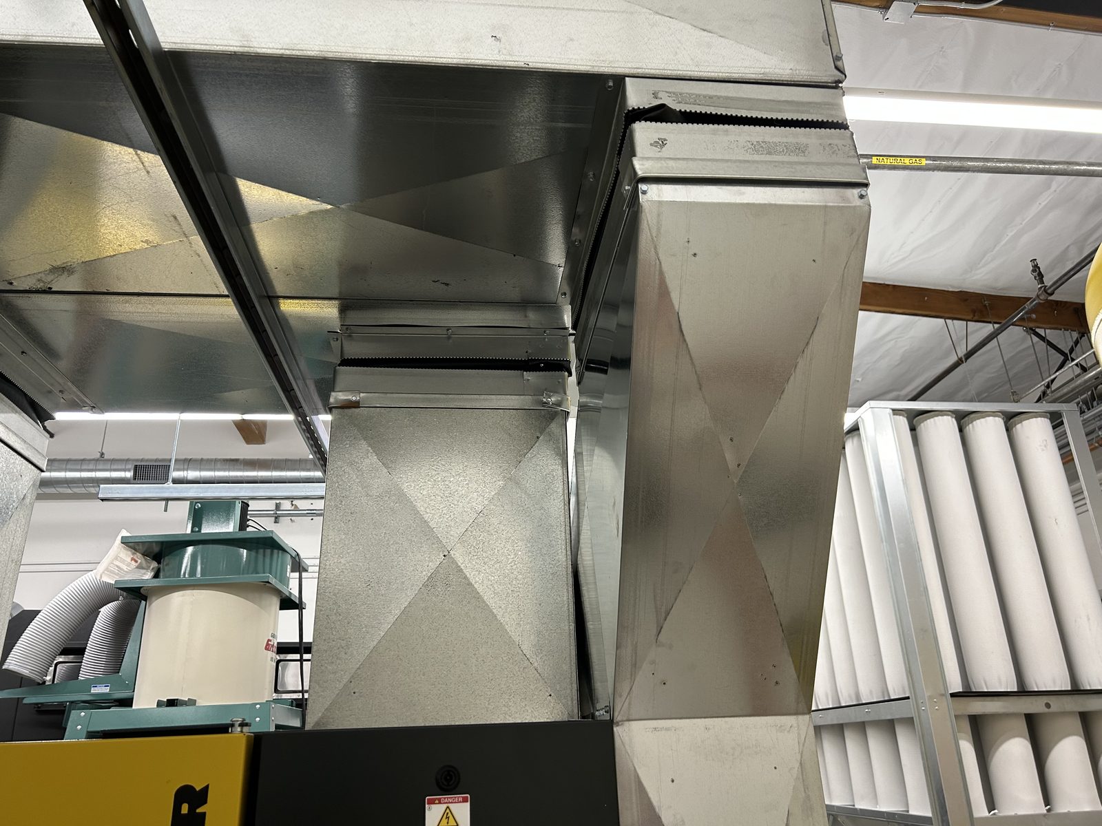 Fabricated intake and exhaust ducting serving a compressor equipment room