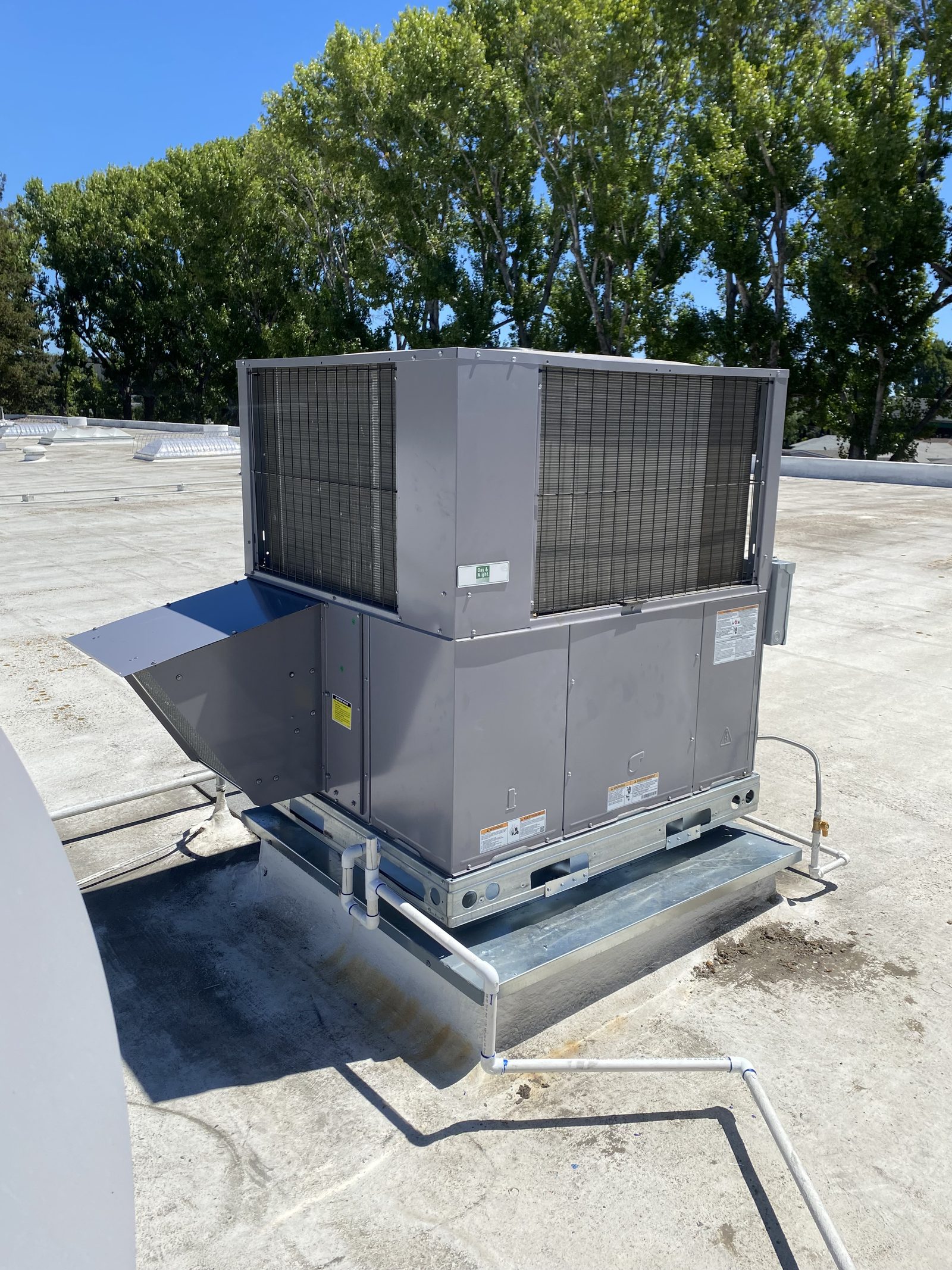 New packaged unit installed on a fabricated curb adapter